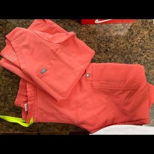 Figs, size. XS in both top and bottom color hot coral